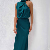 Tyra | Elegantti iltapuku, jossa on halterneck
